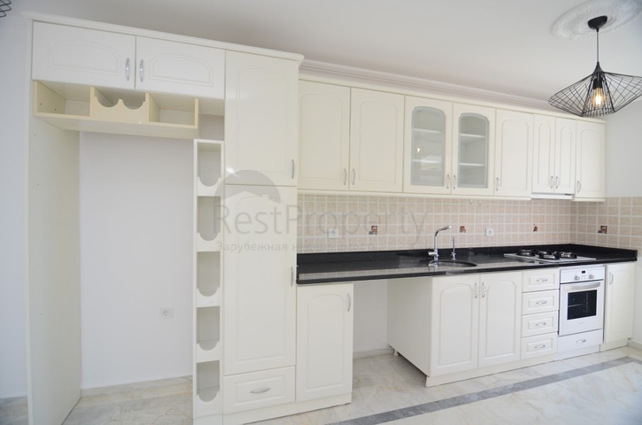 Трехкомнатная квартира в районе Махмутлар