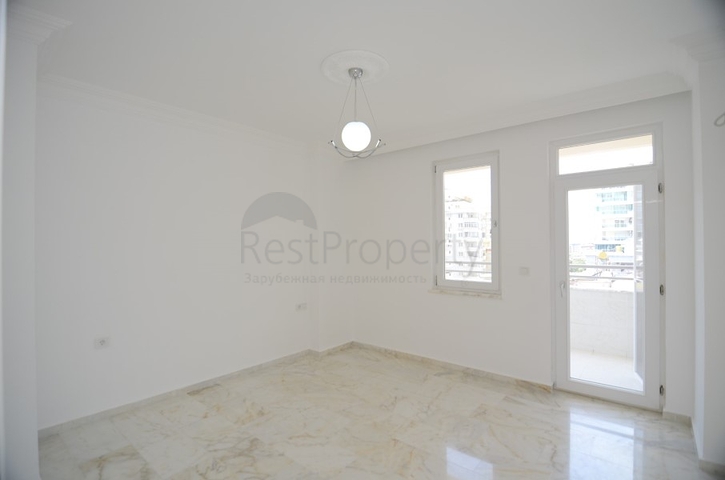 Трехкомнатная квартира в районе Махмутлар