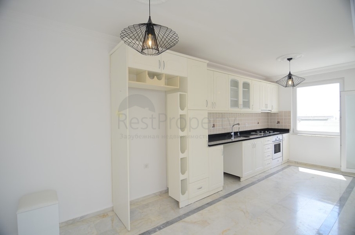 Трехкомнатная квартира в районе Махмутлар