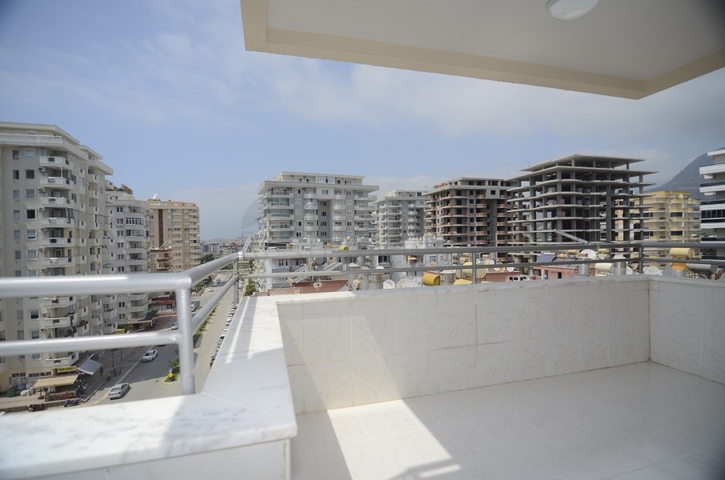 Трехкомнатная квартира в районе Махмутлар