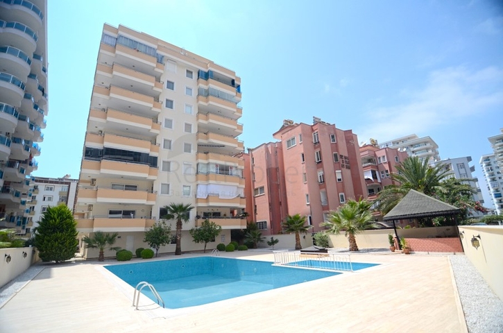 Трехкомнатная квартира в районе Махмутлар