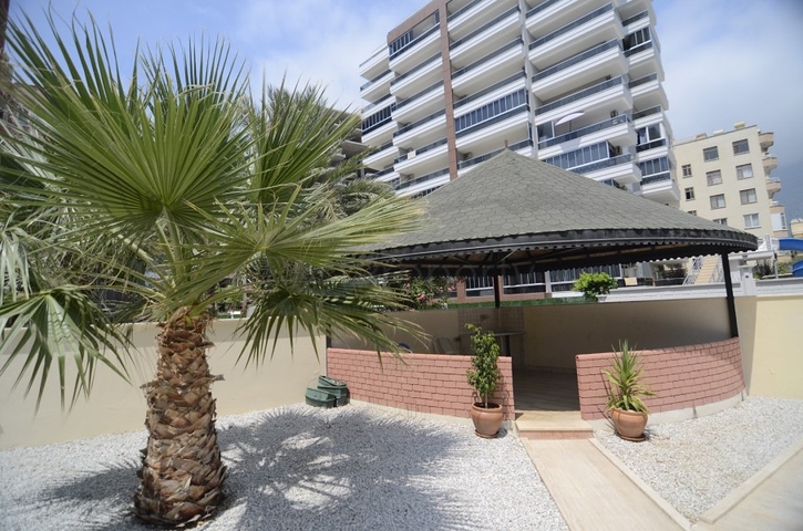 Трехкомнатная квартира в районе Махмутлар