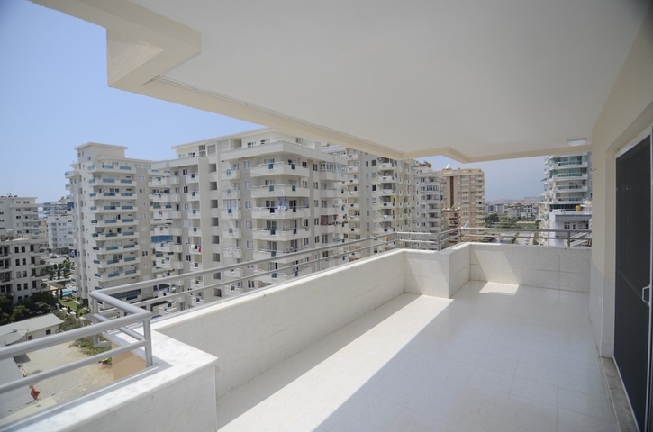 Трехкомнатная квартира в районе Махмутлар