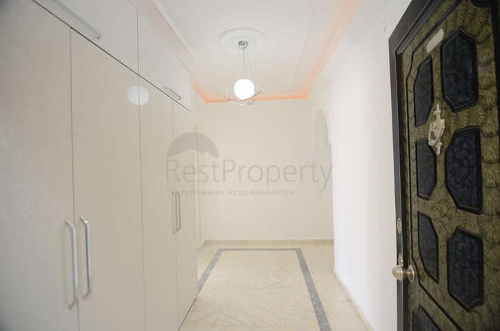 Трехкомнатная квартира в районе Махмутлар