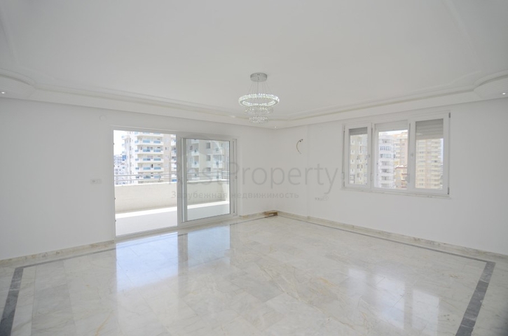 Трехкомнатная квартира в районе Махмутлар