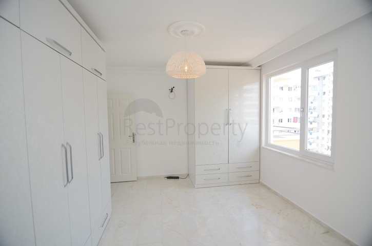 Трехкомнатная квартира в районе Махмутлар