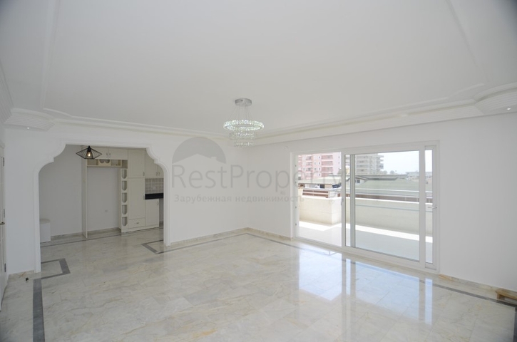 Трехкомнатная квартира в районе Махмутлар