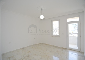 Трехкомнатная квартира в районе Махмутлар