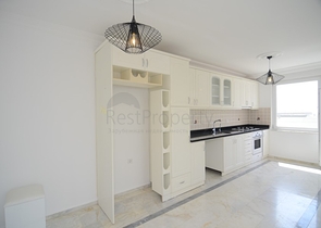 Трехкомнатная квартира в районе Махмутлар