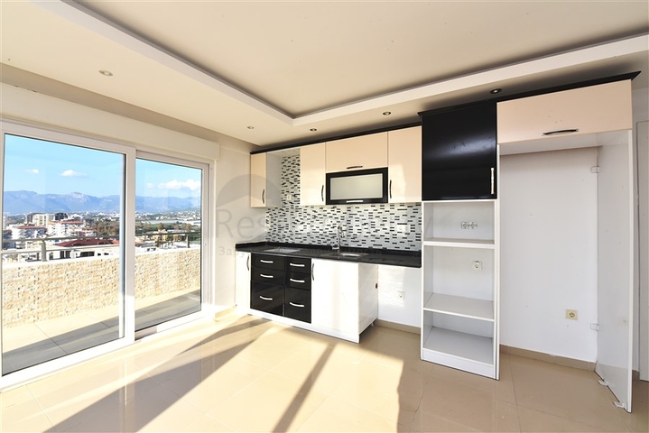 Пентхаус планировки 3+1 в районе Махмутлар