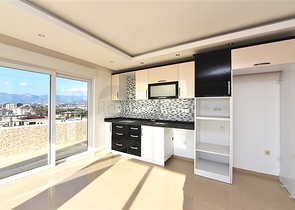 Пентхаус планировки 3+1 в районе Махмутлар