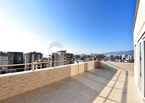 Пентхаус планировки 3+1 в районе Махмутлар