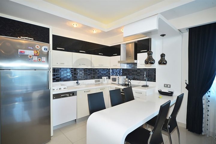 Квартира планировки 3+1 с мебелью в Махмутларе