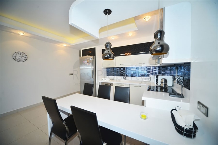 Квартира планировки 3+1 с мебелью в Махмутларе