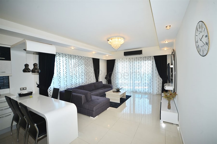 Квартира планировки 3+1 с мебелью в Махмутларе