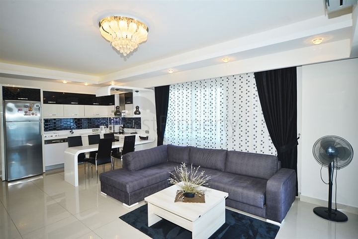 Квартира планировки 3+1 с мебелью в Махмутларе