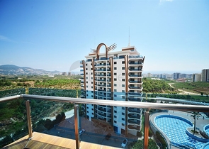 Квартира планировки 3+1 с мебелью в Махмутларе