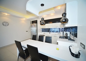 Квартира планировки 3+1 с мебелью в Махмутларе