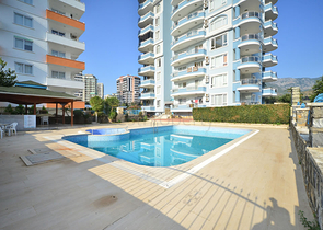 Меблированная квартира планировки 2+1 в районе Махмутлар