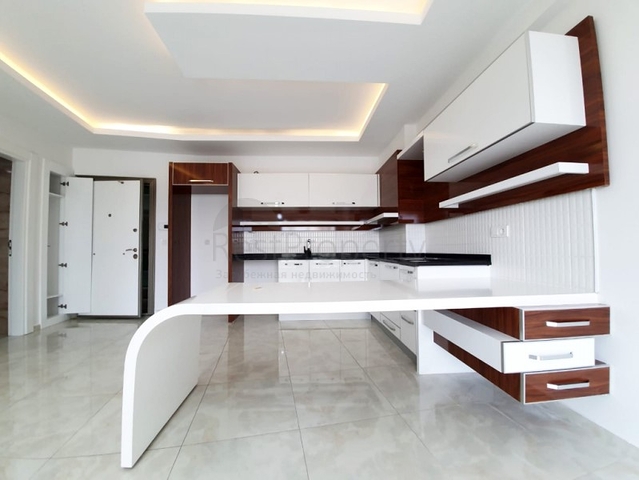 Двухкомнатная квартира в районе Махмутлар