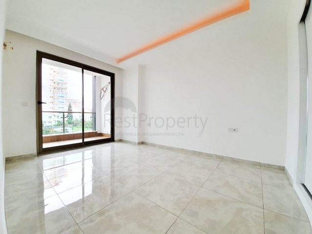 Двухкомнатная квартира в районе Махмутлар