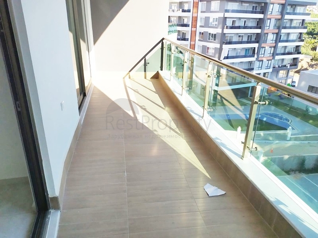 Двухкомнатная квартира в районе Махмутлар