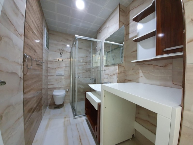 Двухкомнатная квартира в районе Махмутлар