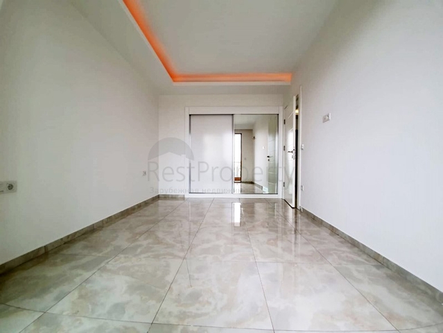 Двухкомнатная квартира в районе Махмутлар