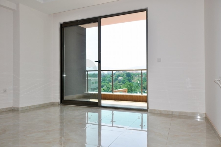 Двухкомнатная квартира в районе Махмутлар