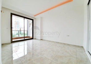 Двухкомнатная квартира в районе Махмутлар