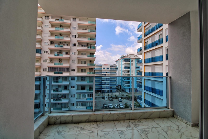 Двухкомнатная квартира в районе Махмутлар