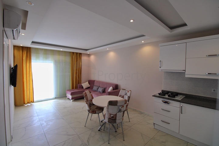 Двухкомнатная квартира в районе Махмутлар