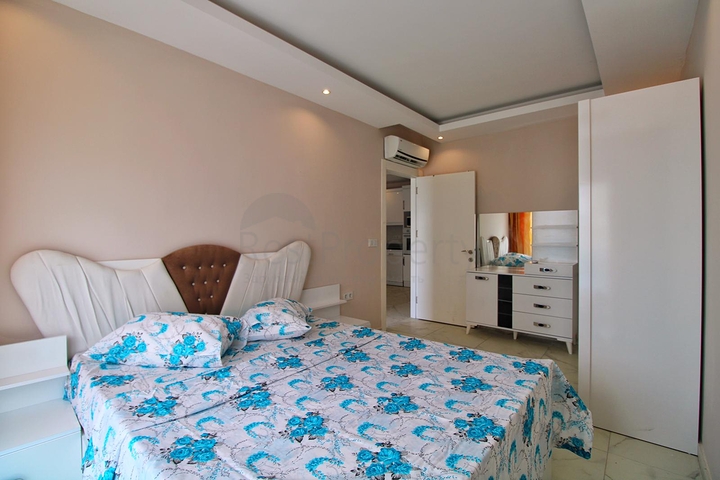 Двухкомнатная квартира в районе Махмутлар