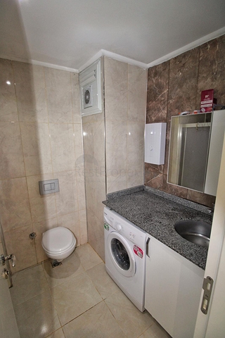 Двухкомнатная квартира в районе Махмутлар