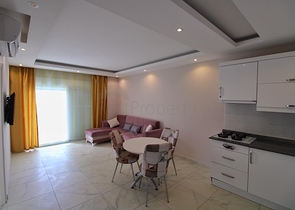 Двухкомнатная квартира в районе Махмутлар