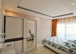 Двухкомнатная квартира в районе Махмутлар