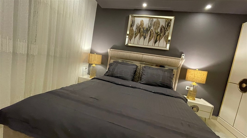 Меблированная квартира планировки 1+1 в жилом комплексе района Махмутлар