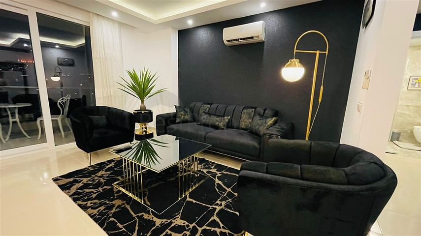 Меблированная квартира планировки 1+1 в жилом комплексе района Махмутлар