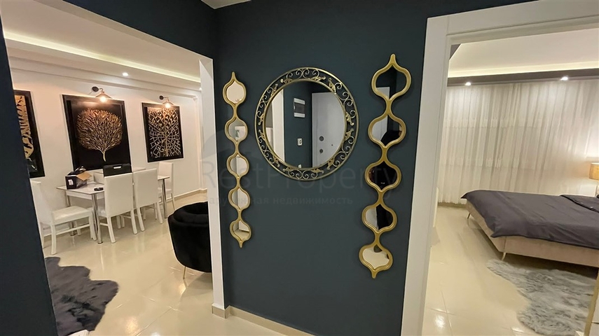 Меблированная квартира планировки 1+1 в жилом комплексе района Махмутлар