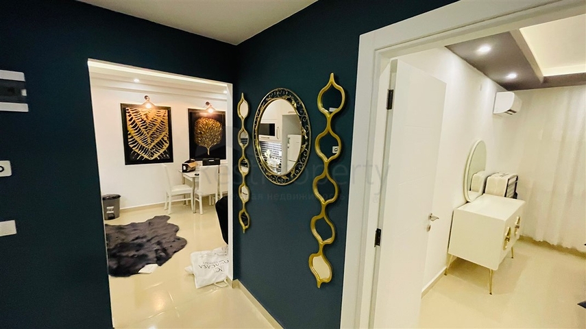 Меблированная квартира планировки 1+1 в жилом комплексе района Махмутлар