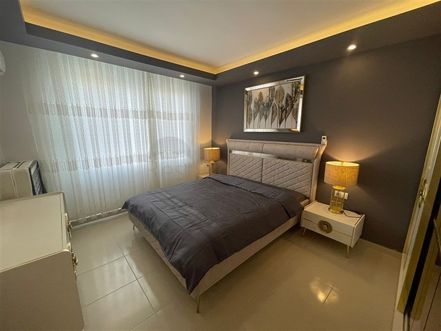 Меблированная квартира планировки 1+1 в жилом комплексе района Махмутлар