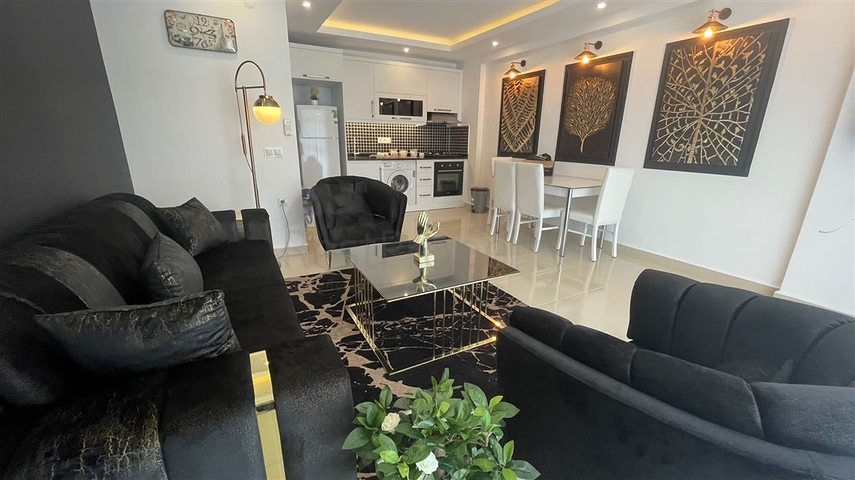 Меблированная квартира планировки 1+1 в жилом комплексе района Махмутлар