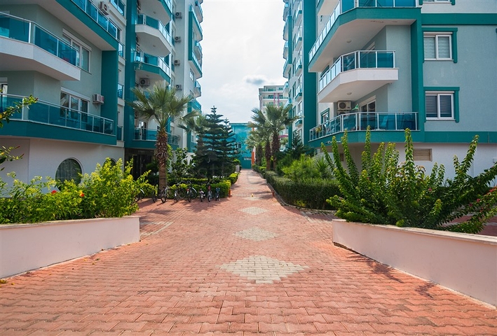 Меблированная квартира планировки 1+1 в жилом комплексе района Махмутлар