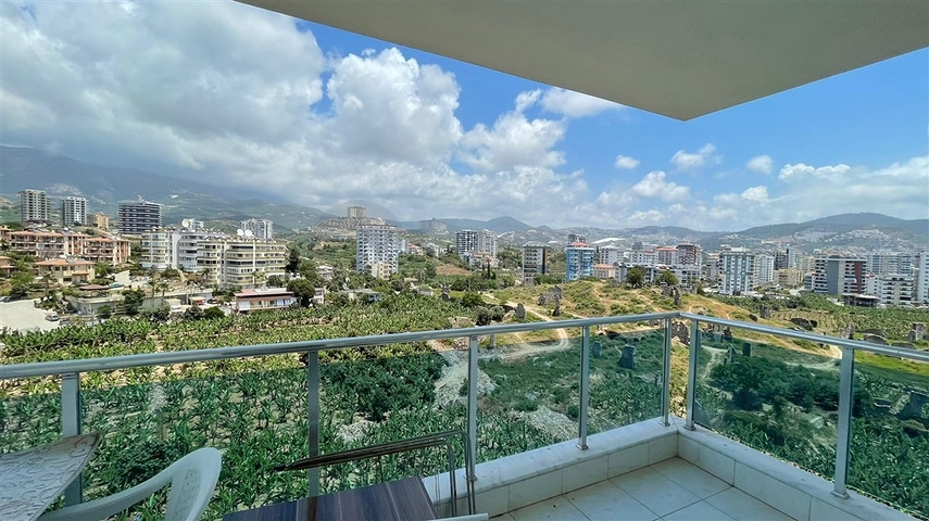 Меблированная квартира планировки 1+1 в жилом комплексе района Махмутлар