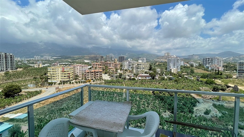 Меблированная квартира планировки 1+1 в жилом комплексе района Махмутлар