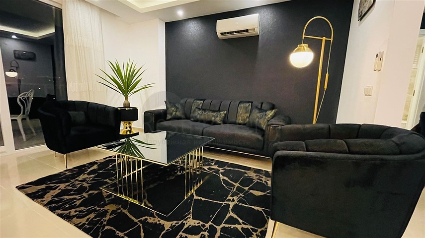 Меблированная квартира планировки 1+1 в жилом комплексе района Махмутлар