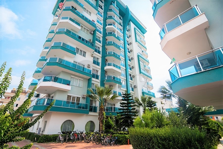 Меблированная квартира планировки 1+1 в жилом комплексе района Махмутлар