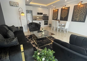 Меблированная квартира планировки 1+1 в жилом комплексе района Махмутлар