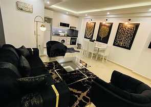 Меблированная квартира планировки 1+1 в жилом комплексе района Махмутлар