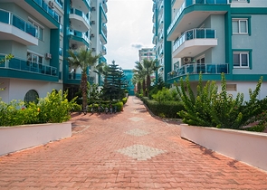 Меблированная квартира планировки 1+1 в жилом комплексе района Махмутлар